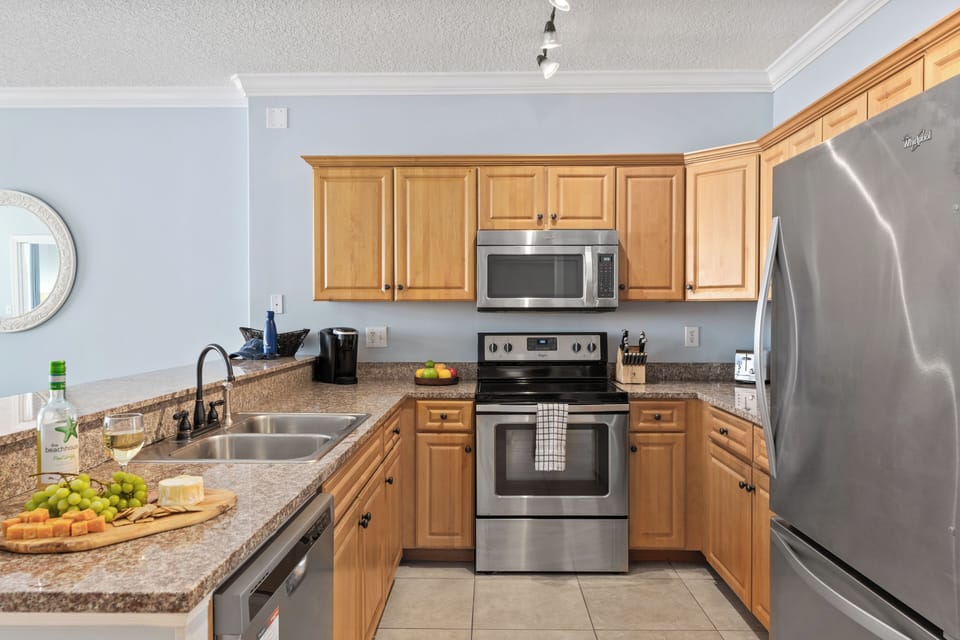 Fully stocked with utensils and appliances.