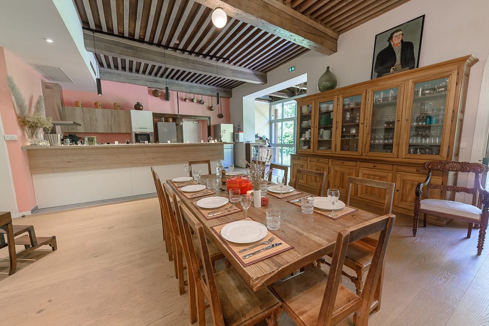 Dining room with fully equipped open kitchen