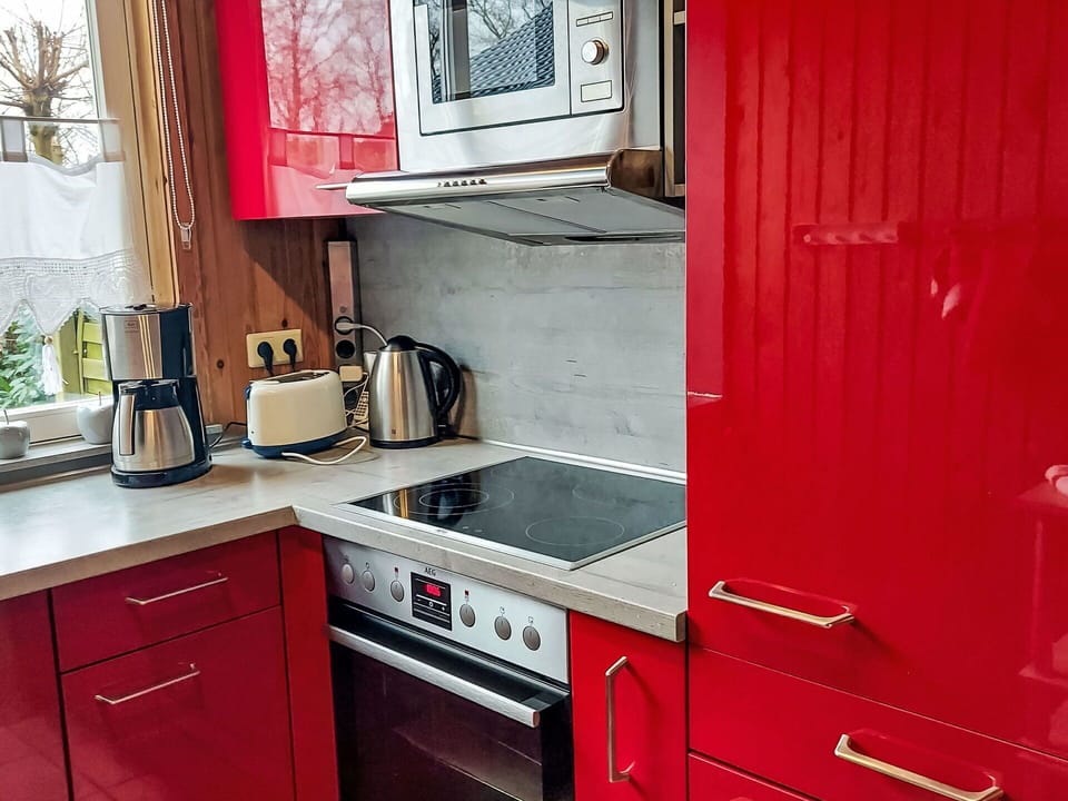 Kitchen Appliance, Kitchen, Red, Major Appliance, Countertop, Cabinetry, Kitchen Sink, Interior Design, Flooring, Furniture
