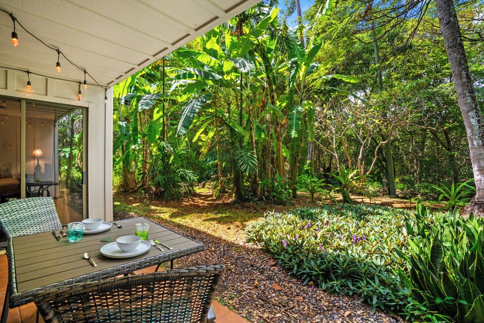 Enjoy your coffee surrounded by the peaceful beauty of a banana grove.