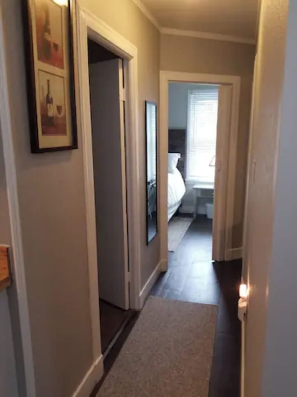 Hallway to bathroom and bedrooms