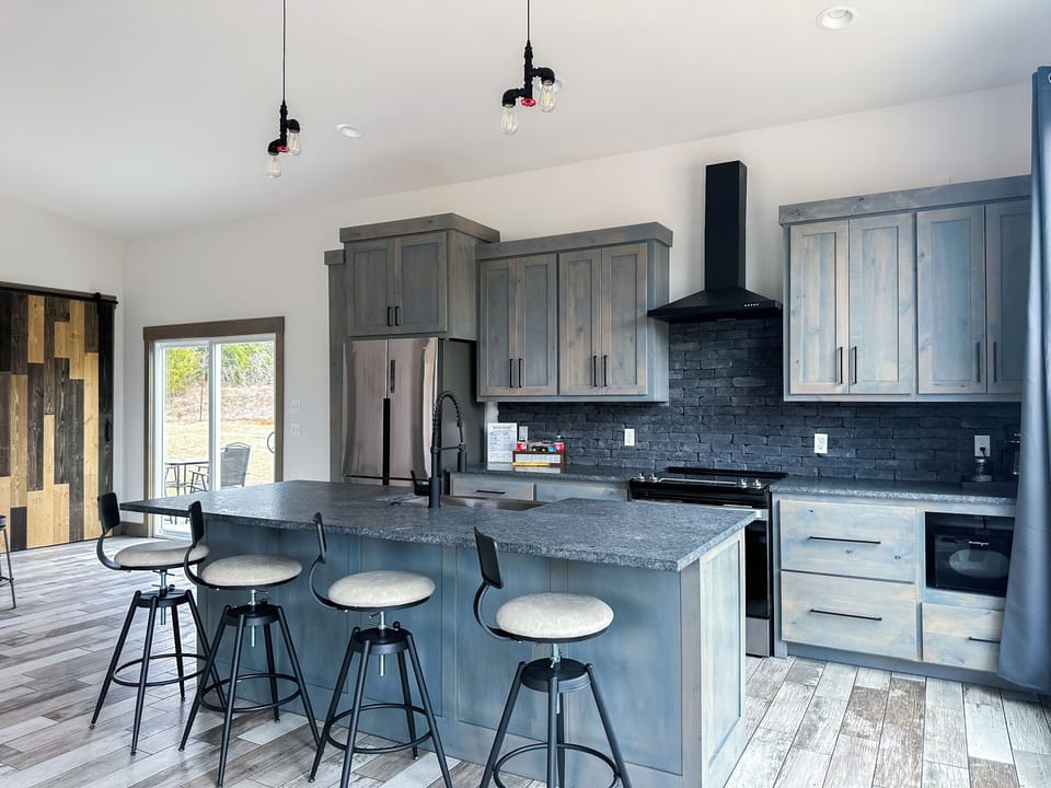 The spacious eat-in kitchen provides all the comforts of home.