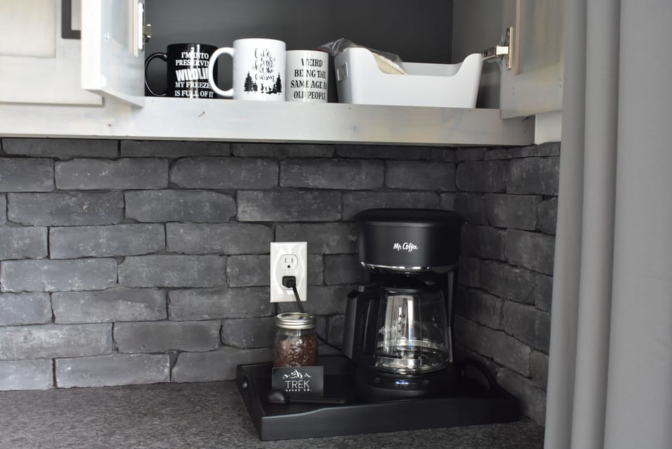 Complimentary coffee provided. Fresh ground medium roast, caffeinated coffee.
