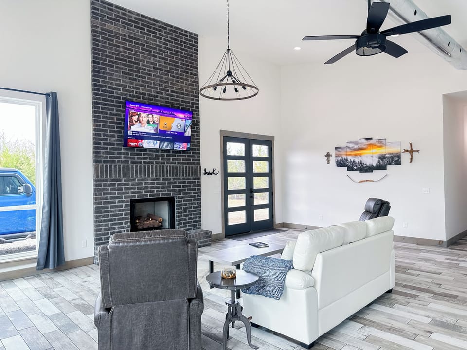 Snuggle up on the stylish couch & enjoy streaming your favorite shows. 