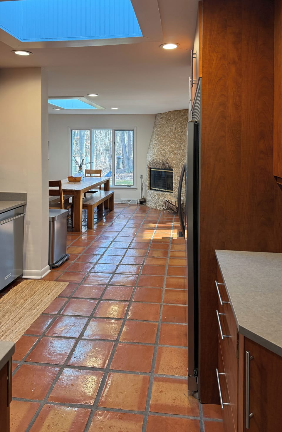 Large kitchen and dinning area with skylights for lots of natural lighting