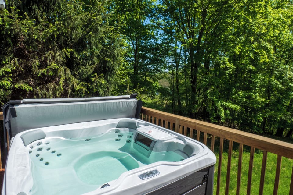 Relax out on the deck in the hot tub.