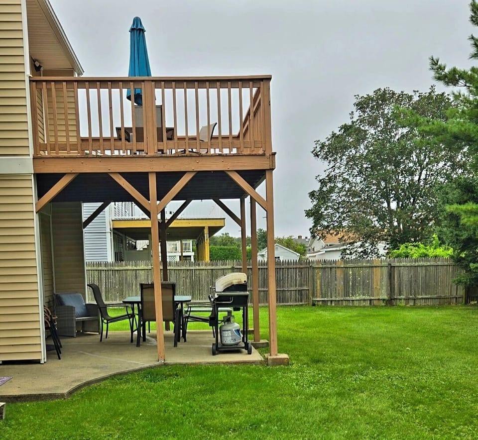 two decks lower patio gas grill and upper deck nice sitting bonus area.