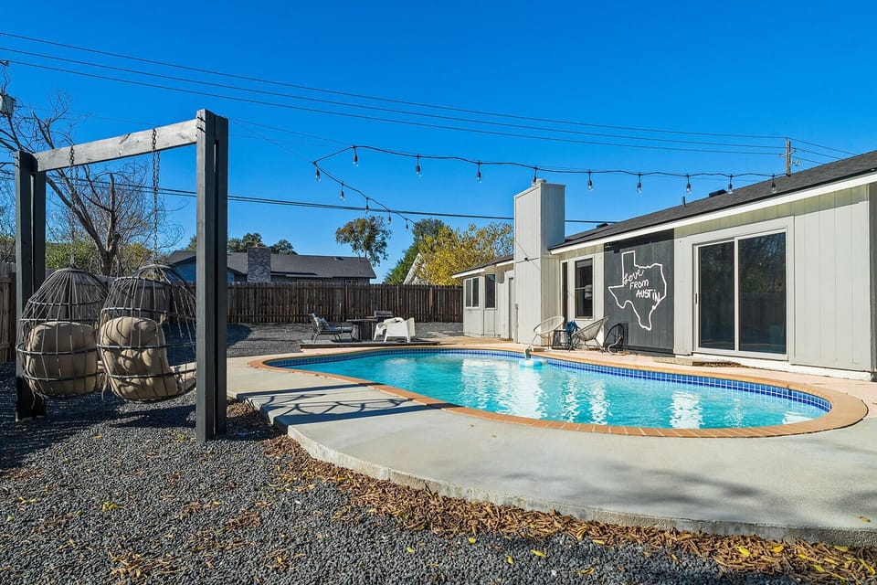 Relax by the pool 🌊☀️, where stunning views and a serene atmosphere await.
