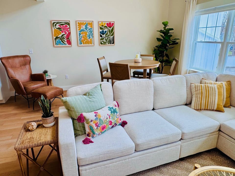 Comfy chair high top game table and sectional offer plenty of seating options.