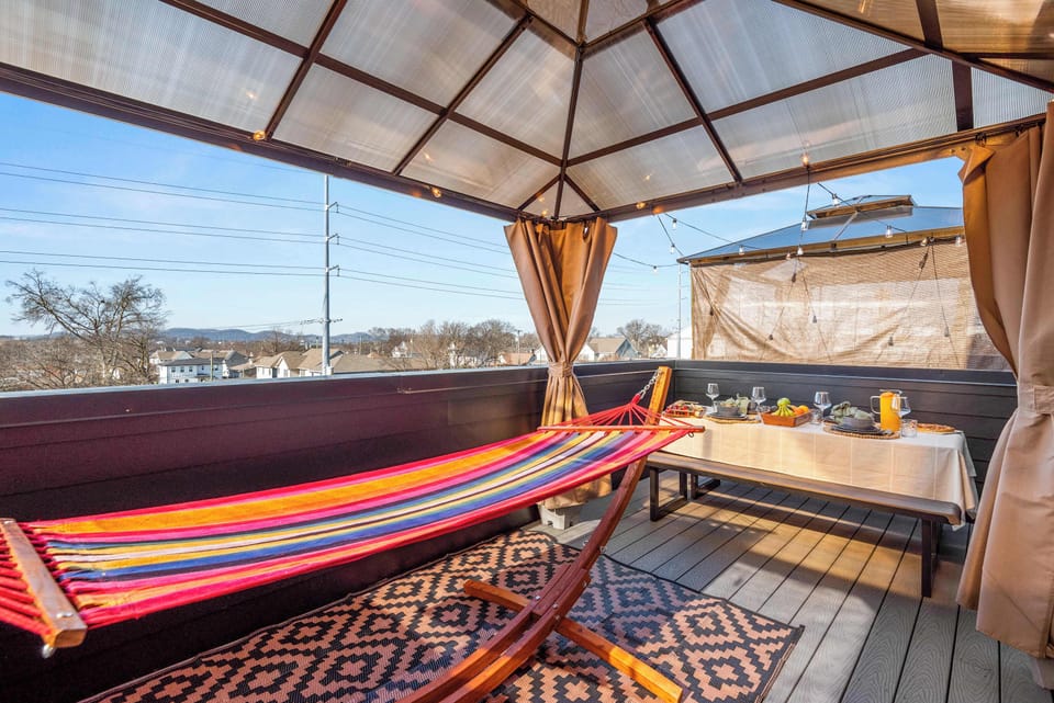 Rooftop deck with hanging hammock chair