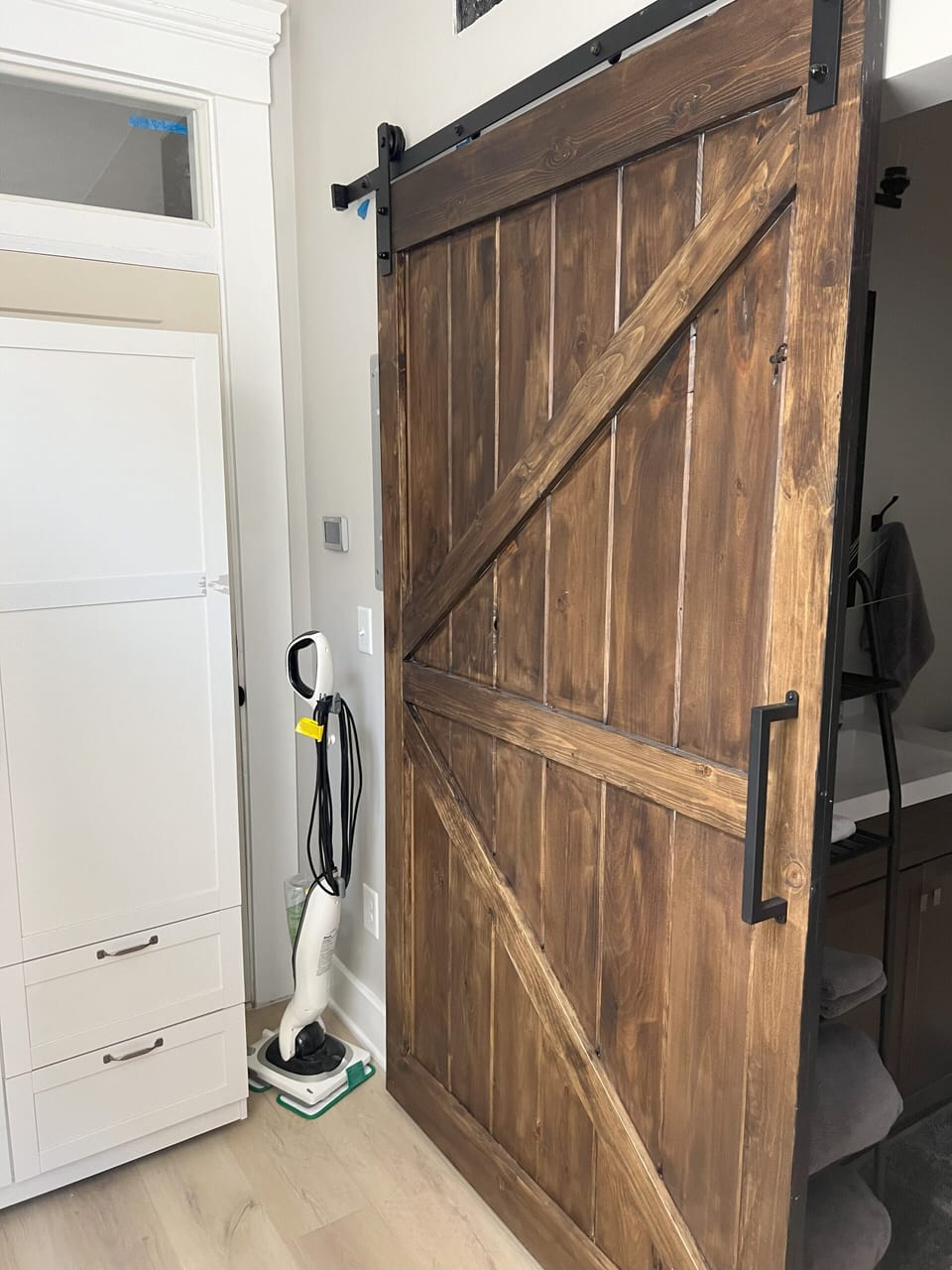 Both bathrooms have these gorgeous barn-doors