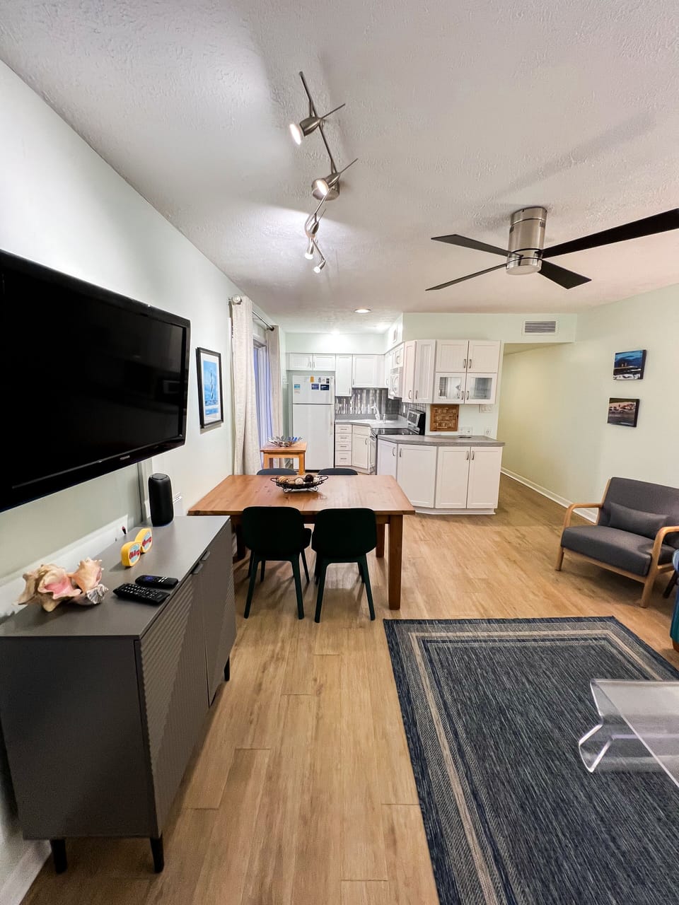 Open concept living, dining and kitchen areas
