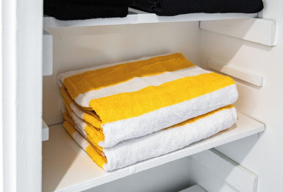 Fresh, clean towels and linens provided for every guest stay