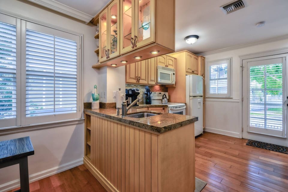 With plenty of counter space, the kitchen makes meal prep easy and convenient, allowing you to cook with ease and comfort.