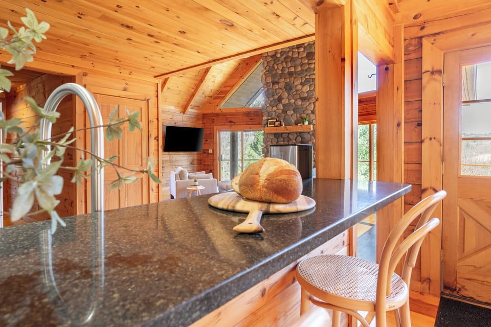Barstool seating at the kitchen counter.