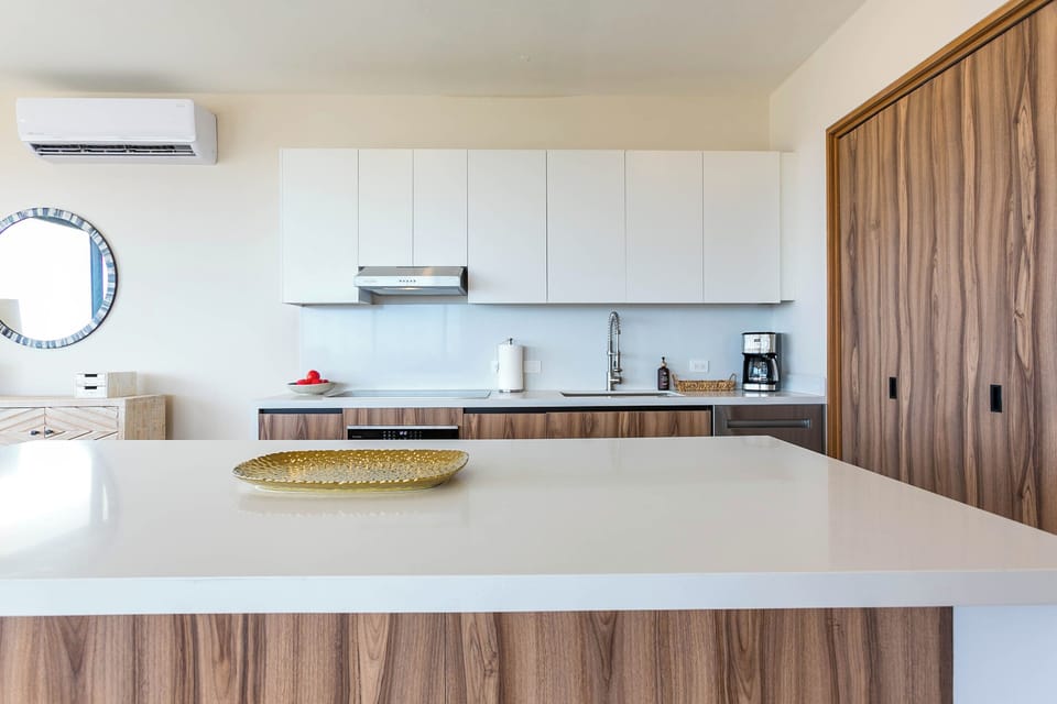 Convenient washer and dryer located just off the kitchen, making it easy to take care of laundry during your stay.