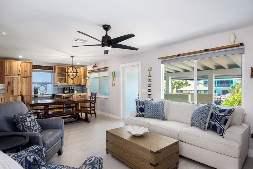 Open floor concept door leads to balcony.