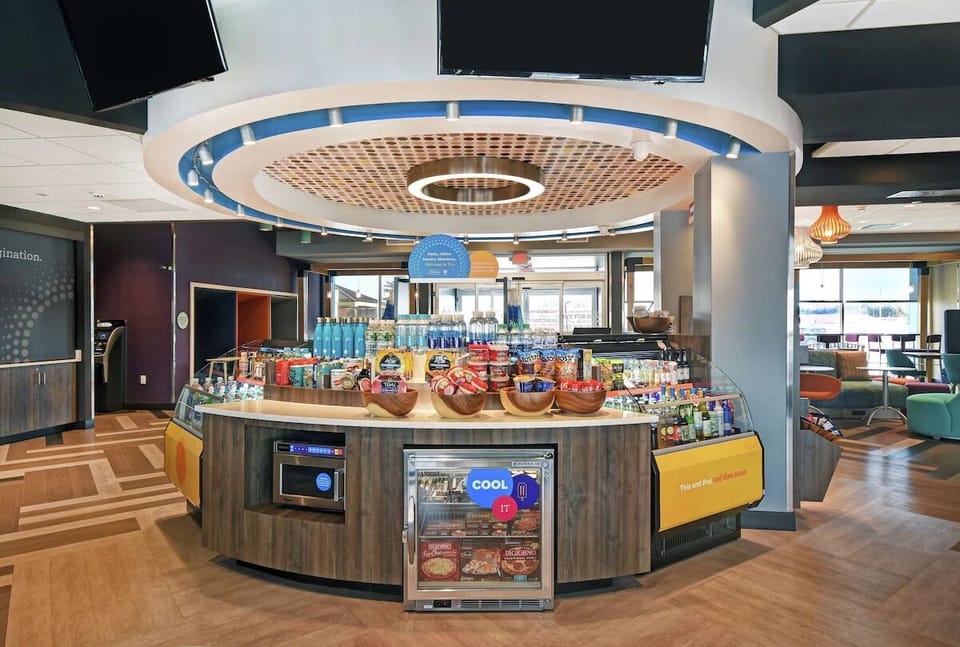 Grab late-night snacks and drinks in the bright lobby market.