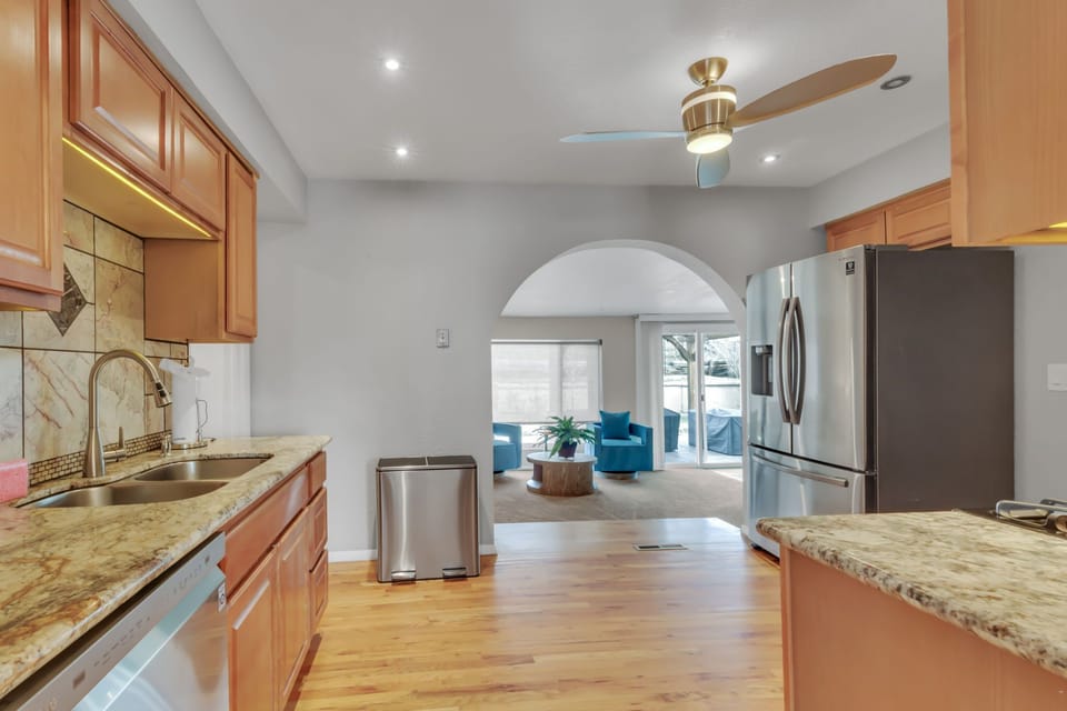 Whole area of the kitchen with ceiling fan