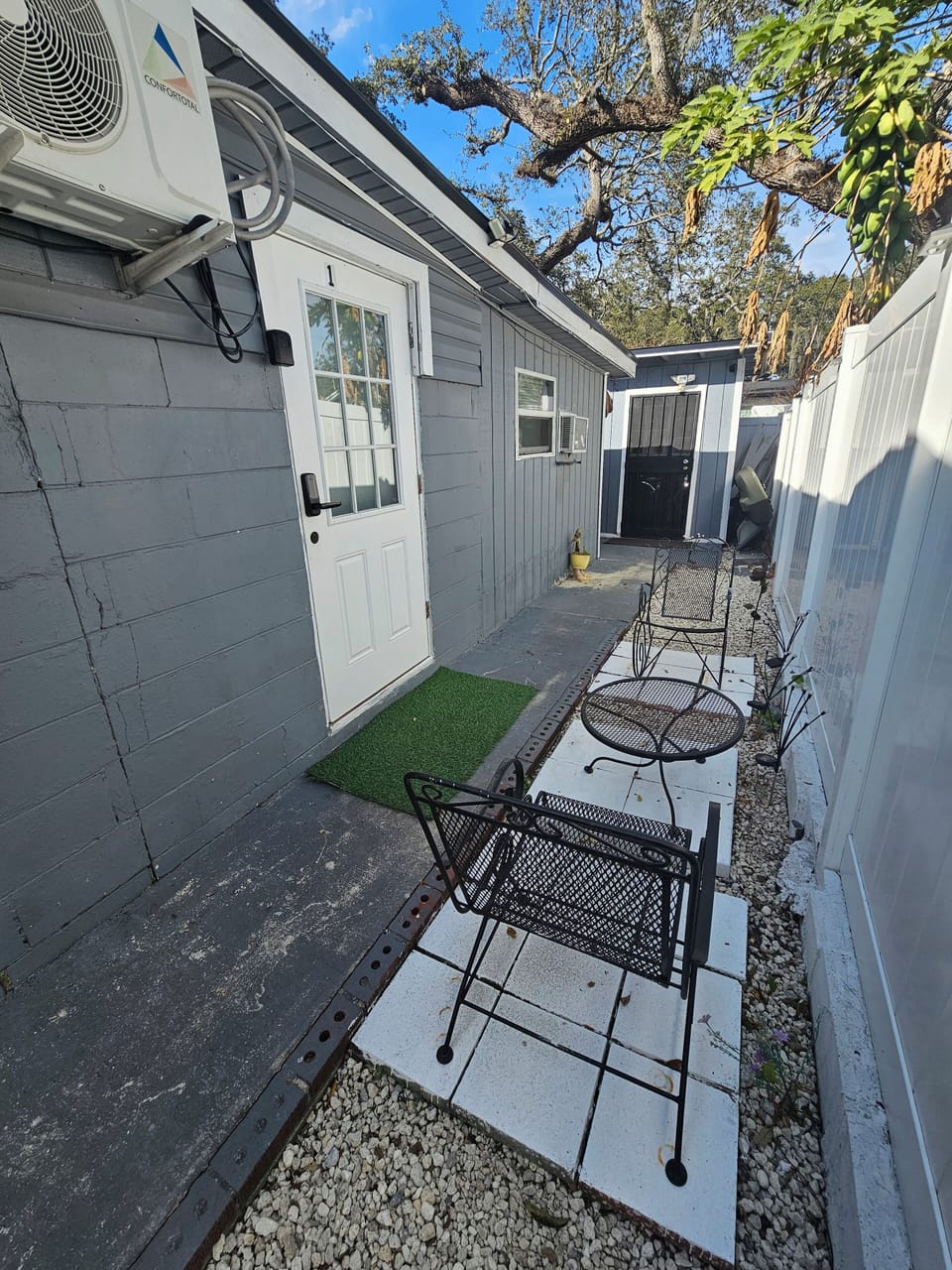 Exterior patio outside your door.