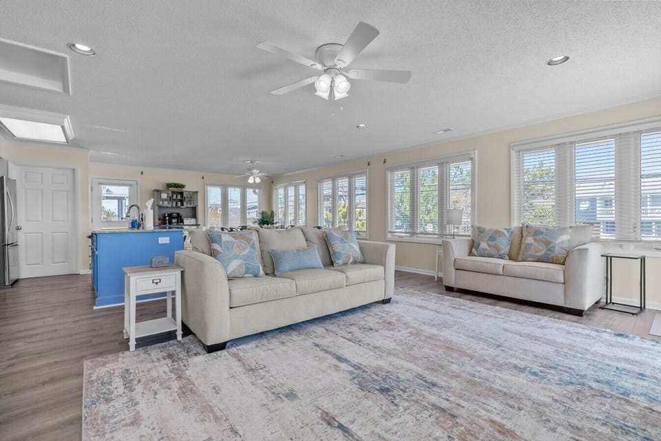 Open and inviting living area featuring cozy seating and a warm, welcoming atmosphere.
