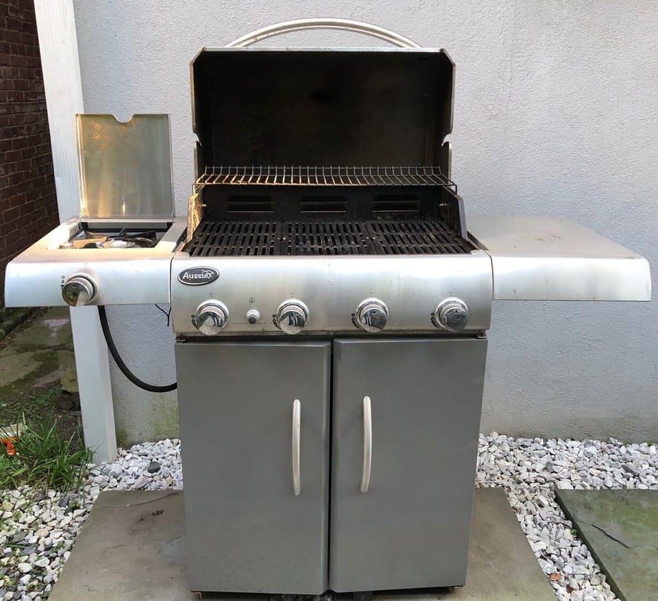 Grill with ease using the four-burner gas BBQ—ready for everything from casual burgers to full-on cookouts.