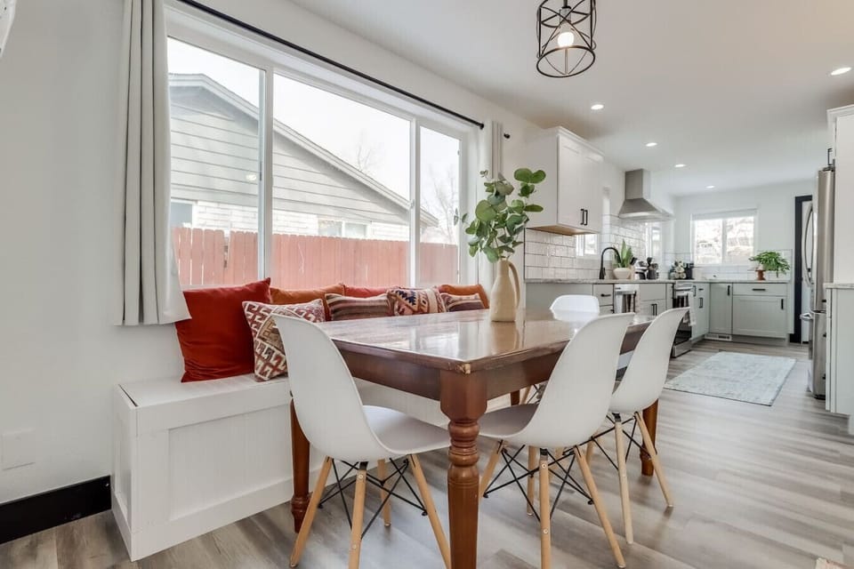 Dining area with open floor plan and plenty of natural light