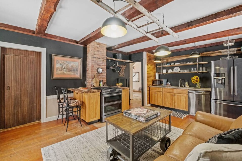 Rustic kitchen blending comfort and style with modern appliances.