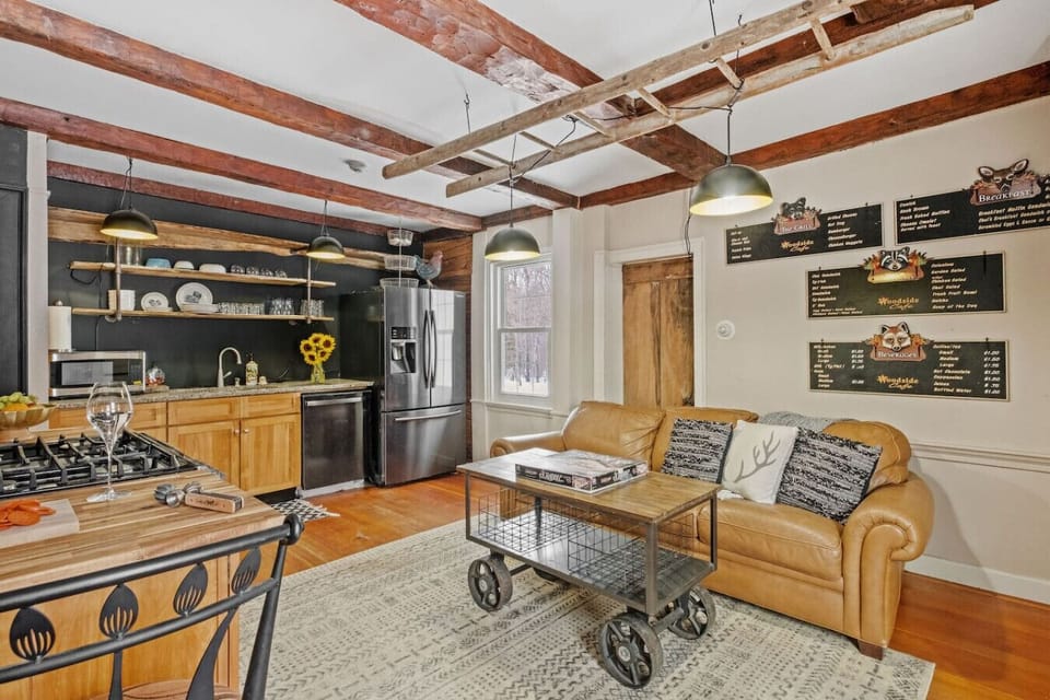 Spacious kitchen and lounge area designed for connection.