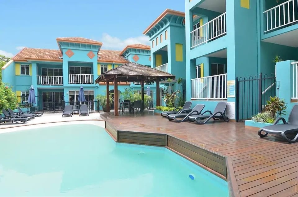 Complex pool - apartment is located off to the right of the cabana in this picture.