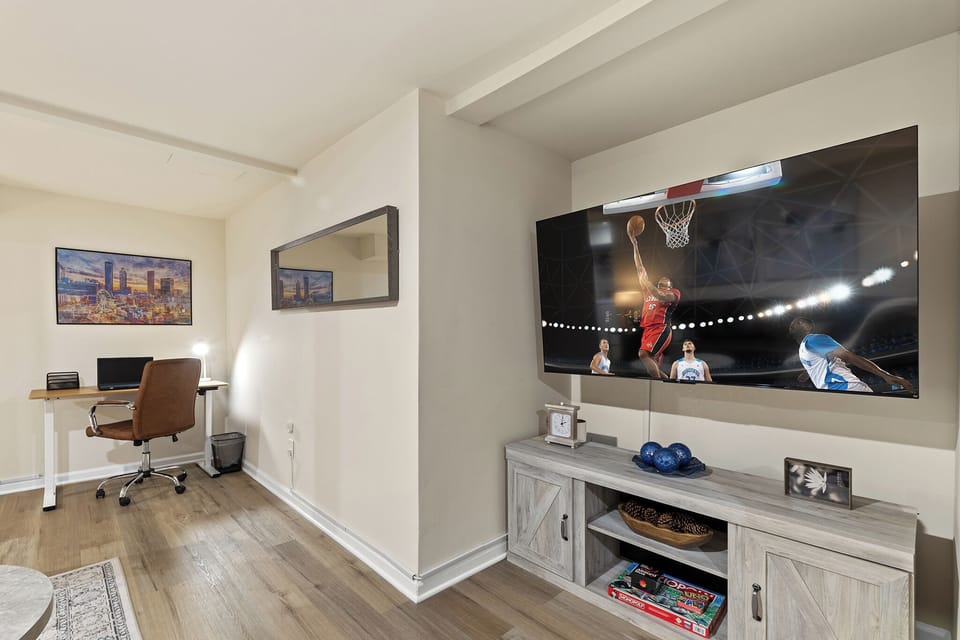 Flat screen TV in living room. Perfect for movies and streaming!