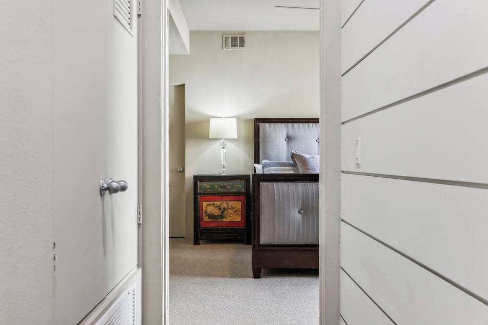 Welcome to the inviting second bedroom, perfect for a restful night’s sleep! Featuring a comfortable bed and stylish decor, it’s designed for relaxation. Enjoy natural light and ample storage, making it a cozy retreat after a day of exploring!