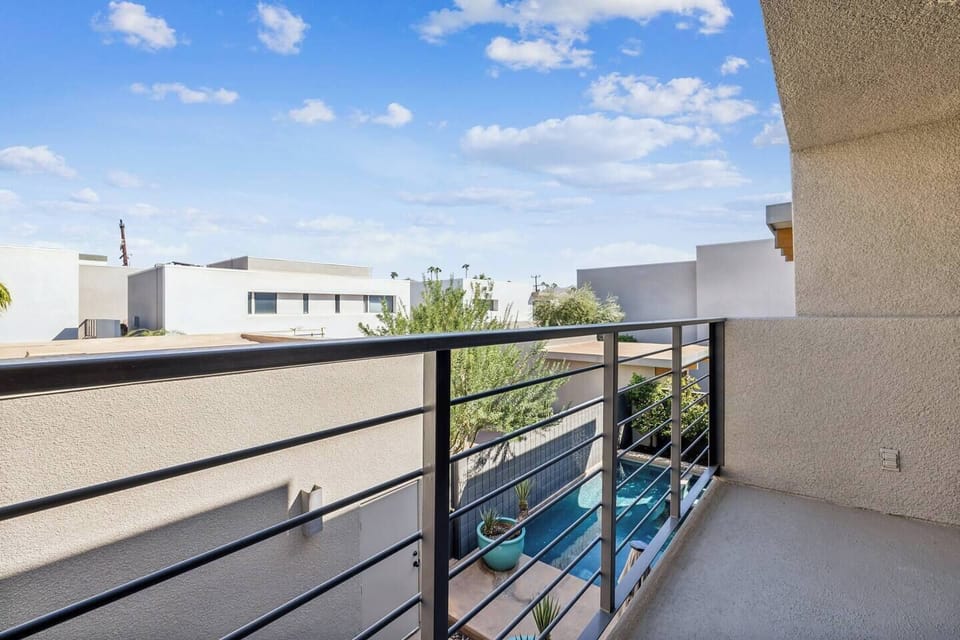 Unwind on our charming balcony, where stunning views meet cozy comfort! Enjoy your morning coffee surrounded by lush plants and gentle breezes. Its the perfect spot to soak in the scenery and savor the tranquility of your getaway. Relax and recharge!