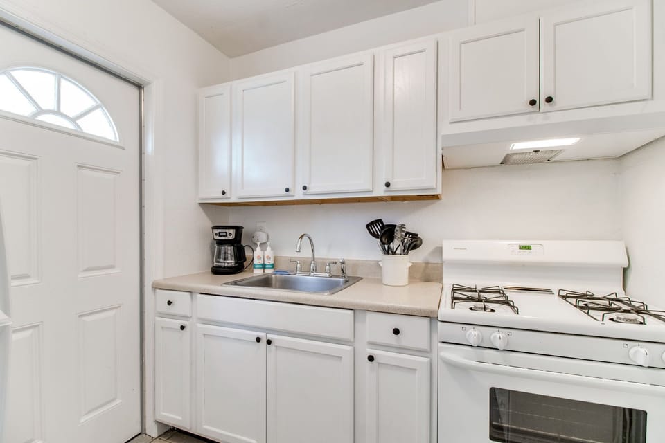 Fully stocked with a gas stovetop, microwave, and coffee maker to make meals a breeze.