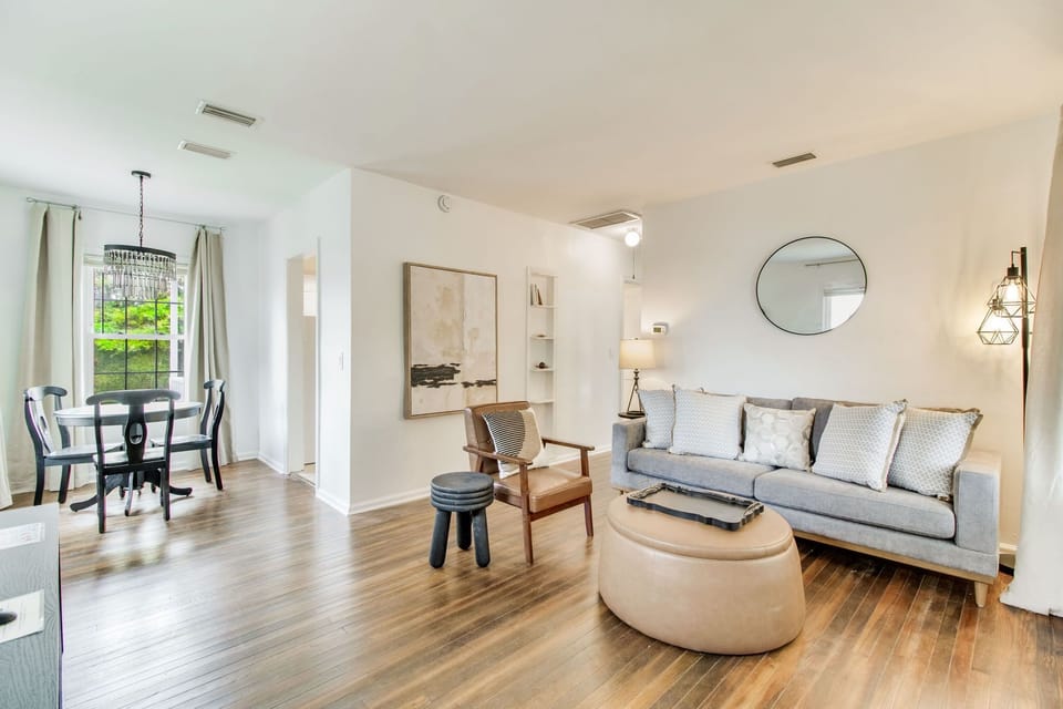 Sink into the cozy couch and stream your favorites on the mounted Smart TV.