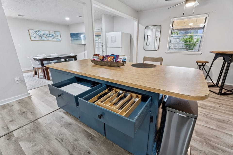 Fully stocked kitchen! Plates, bowls, mugs, pots, pans, spices, and cleaning supplies—ready to make your stay seamless and self-sufficient.