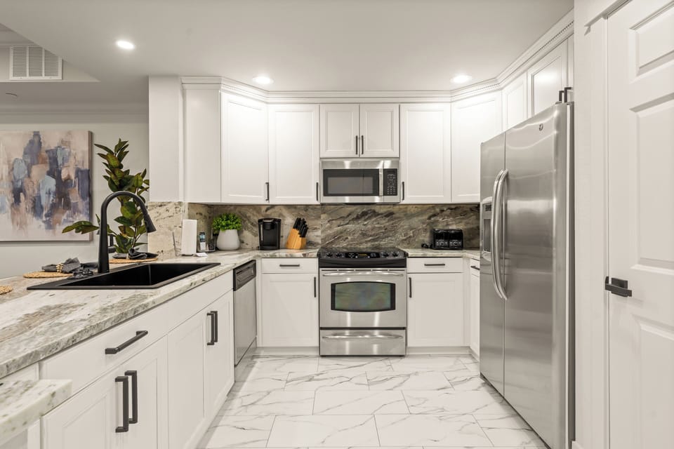 Gourmet kitchen with stainless steel appliances.
