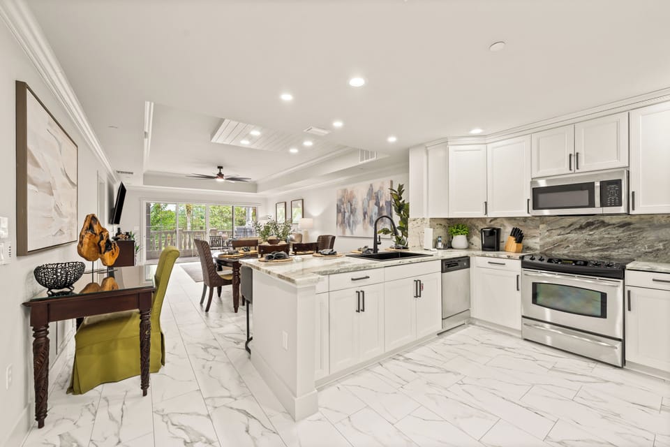 Gourmet kitchen, dining space and work space in this new open floor plan.