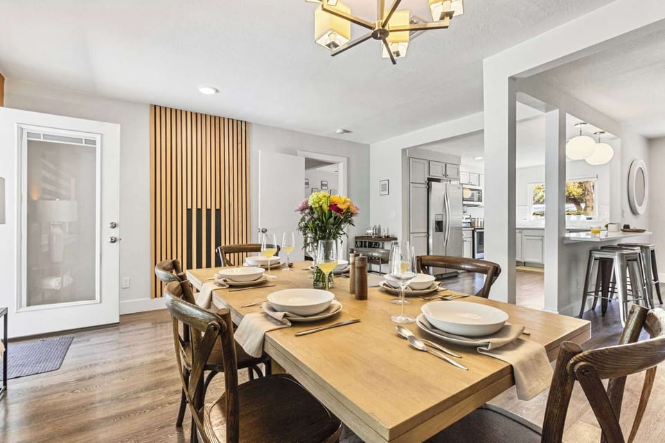 Experience a seamless flow from the kitchen to the table. Our open dining area is designed for togetherness.Whether you're hosting a family dinner or a brunch spread, there's a seat for everyone.