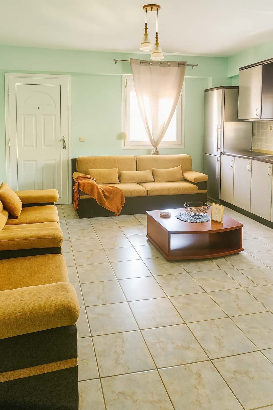 Bright & Airy Living Room
Sunlit living area with comfortable seating, perfect for relaxing indoors after a day at the beach.