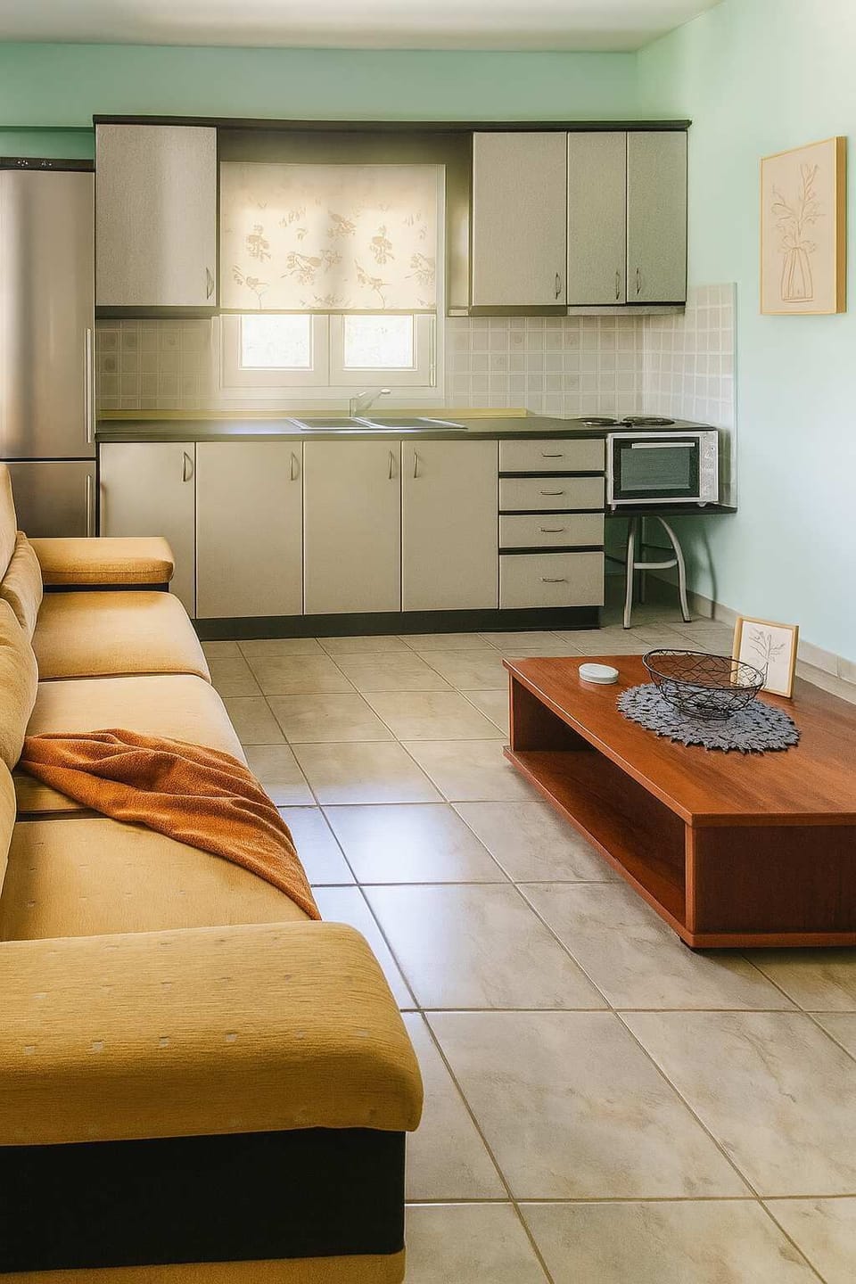 Fully Equipped Modern Kitchen
Sleek and modern kitchen fitted with all essential appliances and utensils for a comfortable cooking experience.