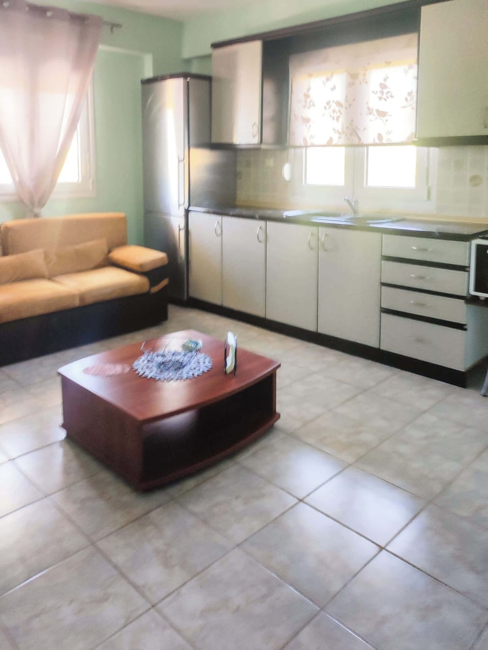 Open-Plan Kitchen & Dining Area
Fully-equipped kitchen area adjacent to the living space, designed for convenience and functionality.

