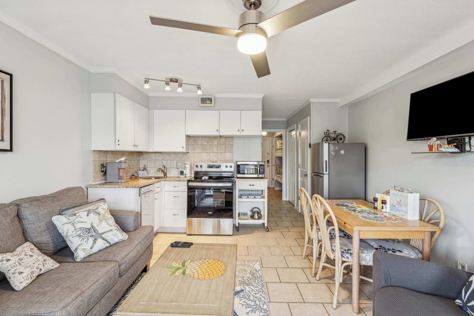 Relax in the living room with a smart TV and sofa sleeper!