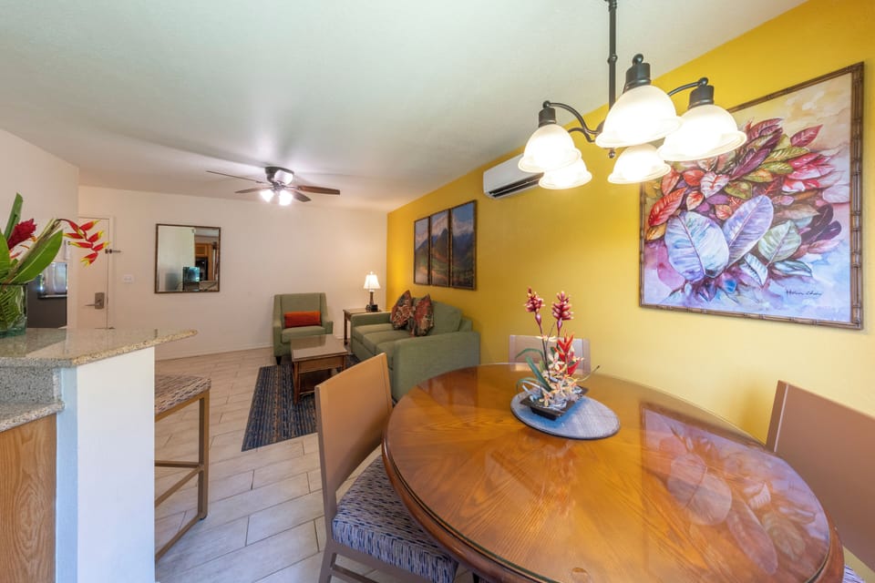 Sip coffee at the dining table under warm, glowing lights.