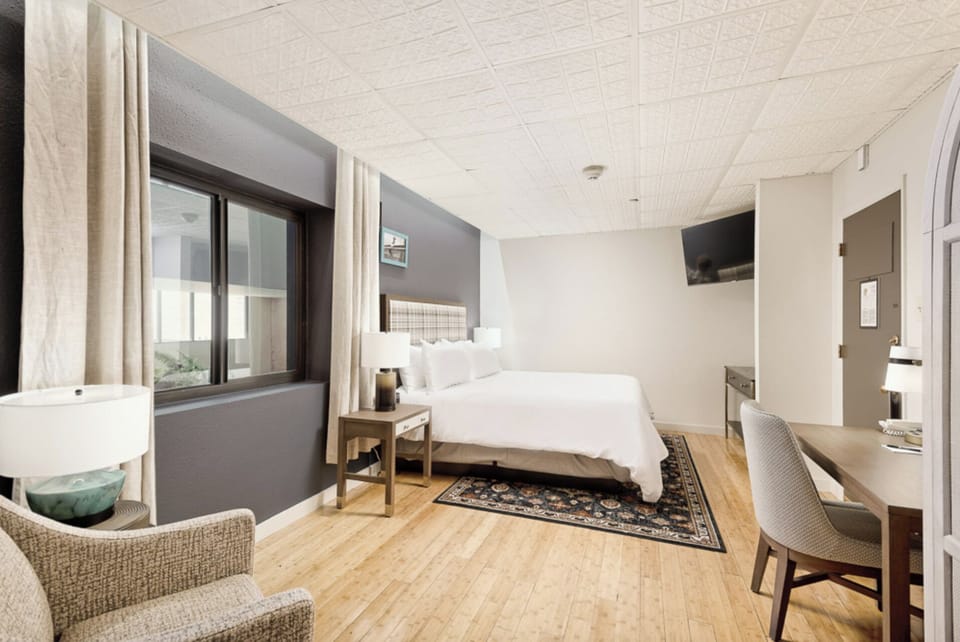 Settle in with a spacious layout, desk, and in-room TV.