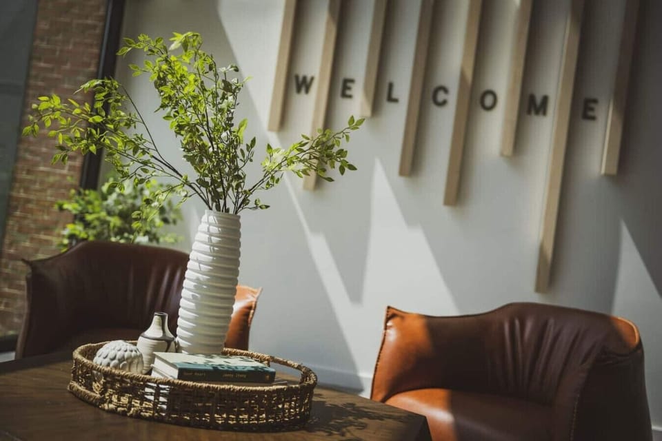 Inviting entry lounge with designer touches. 🪴