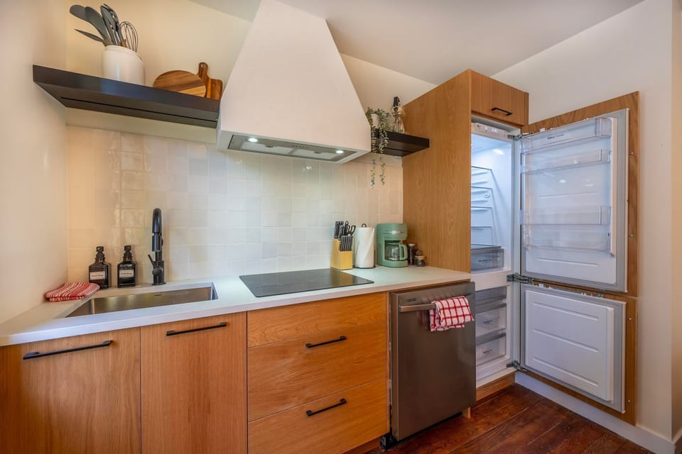 Thoughtfully designed with modern amenities, this kitchen invites you to create delicious meals.