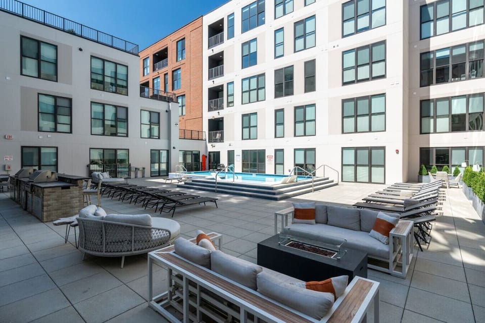Sparkling pool in the building courtyard. A fun warm-weather break for kids and adults alike.