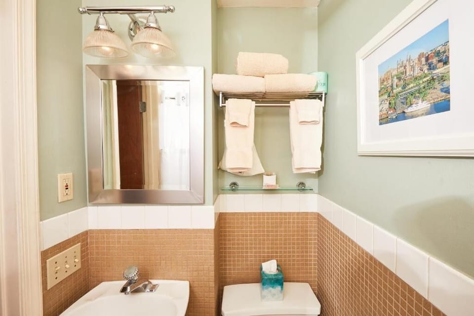 Refresh easily with bright vanity lighting and plush towels.