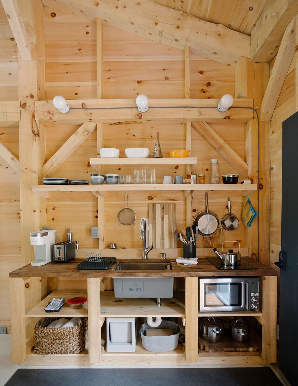 Kitchenette: induction cooktop, combo mw/oven/air-fry, coffee maker, toaster.
